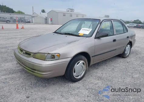 1999 Toyota Corolla Ce from USA, damaged, VIN 2T1BR12E3XC246635
